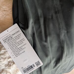 Lululemon Smooth Cover HR Tight 28" in Dark Green